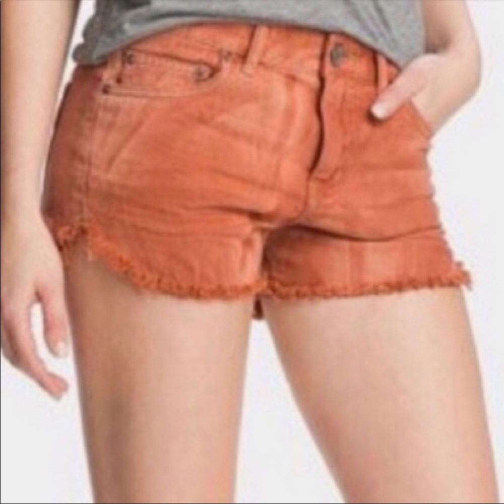 Free People Distressed denim booty Shorts Size 24 Rust orange Frayed raw hem